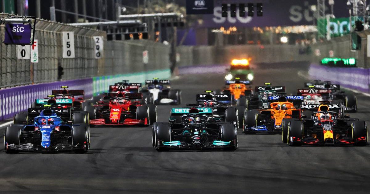 Cars head to turn one on the second restart of the Saudi Arabian GP. Jeddah December 2021.