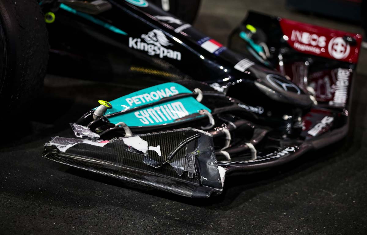 Lewis Hamilton has frotn wing damage. Saudi Arabia December 2021.
