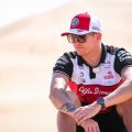 Kimi Raikkonen sitting on a sand dune. Abu Dhabi, December 2021.