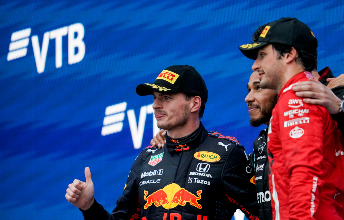 Carlos Sainz on the podium with Lewis Hamilton and Max Verstappen. Russia September 2021