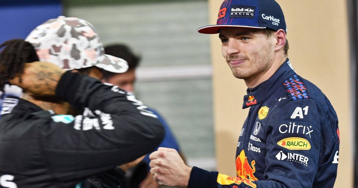 Max Verstappen offers fist bump to Lewis Hamilton. FIA Formula 1 Abu Dhabi, December 2021.