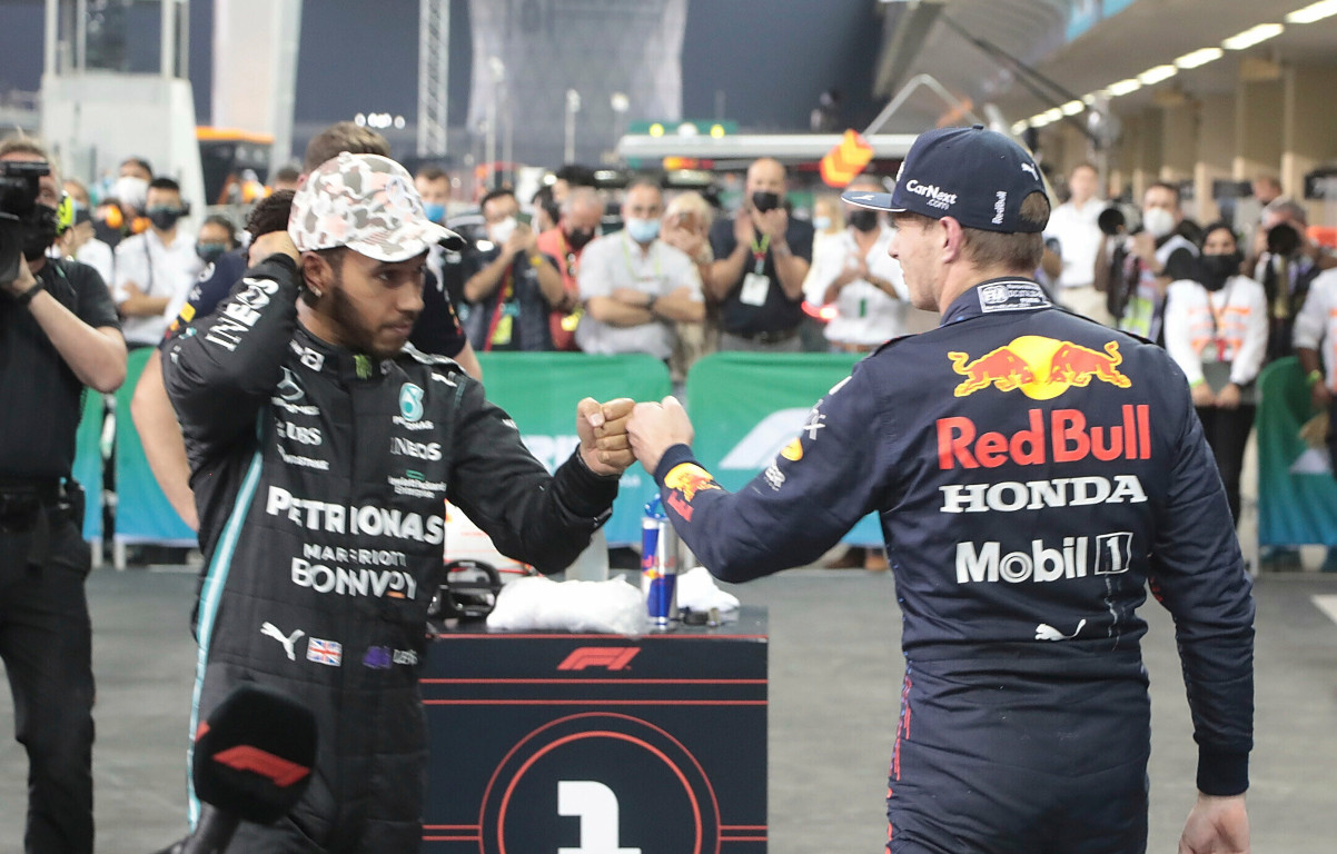 Max Verstappen and Lewis Hamilton fist bump. Abu Dhabi December 2021