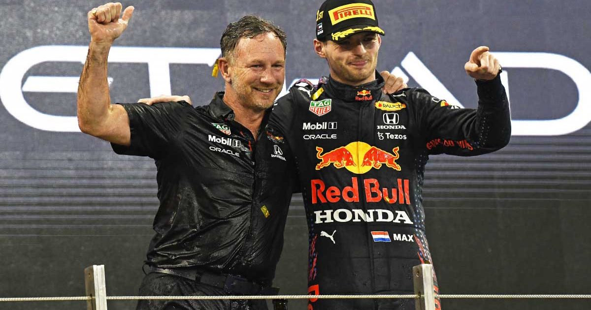 Christian Horner and Max Verstappen celebrate. Abu Dhabi December 2021.