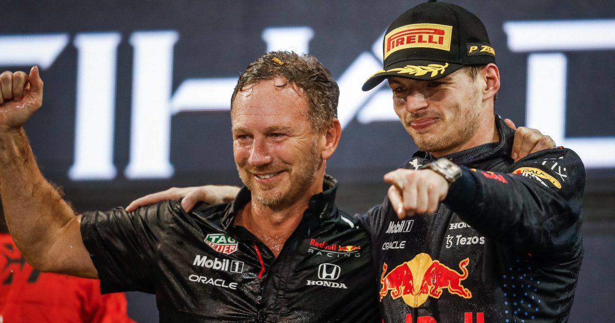 Max Verstappen and Christian Horner celebrate the win. Abu Dhabi December 2021
