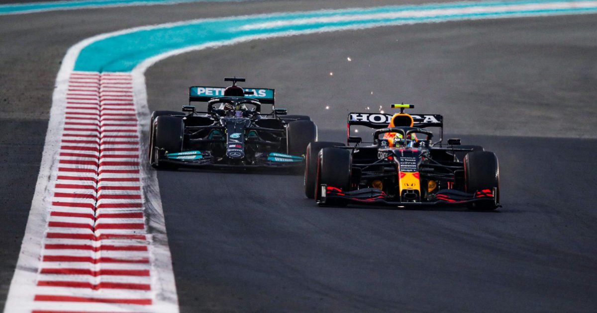 Sergio Perez defending against Lewis Hamilton. Abu Dhabi December 2021