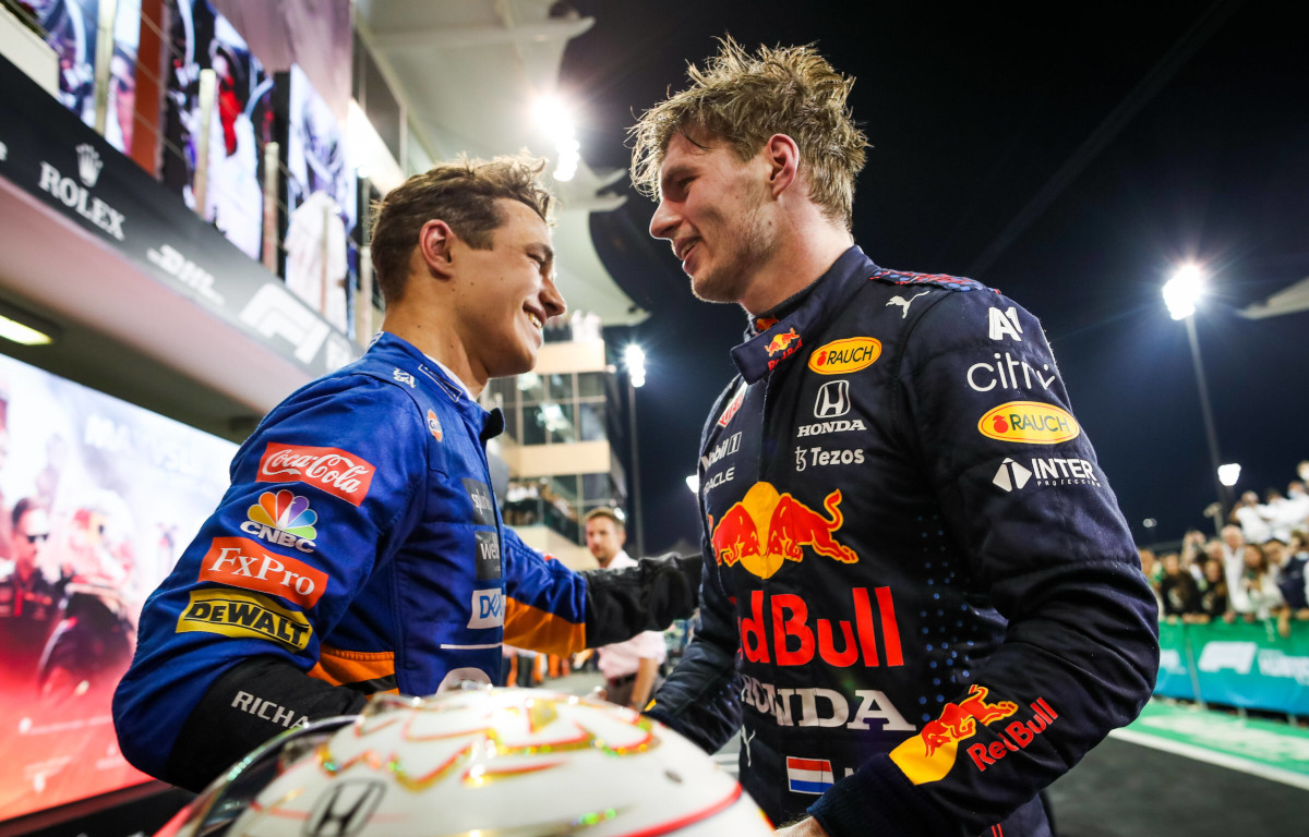 Lando Norris congratulates Max Verstappen on the World title. Abu Dhabi December 2021