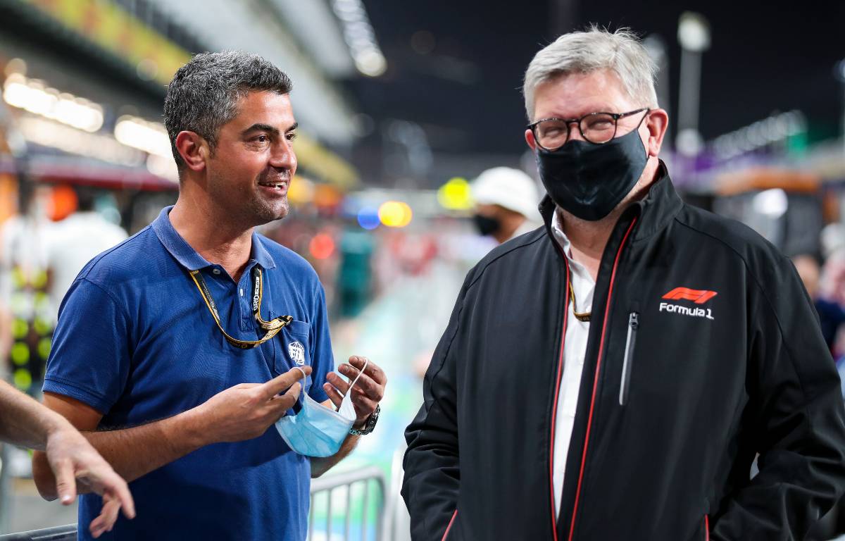 Michael Masi standing next to Ross Brawn. Jeddah December 2021.
