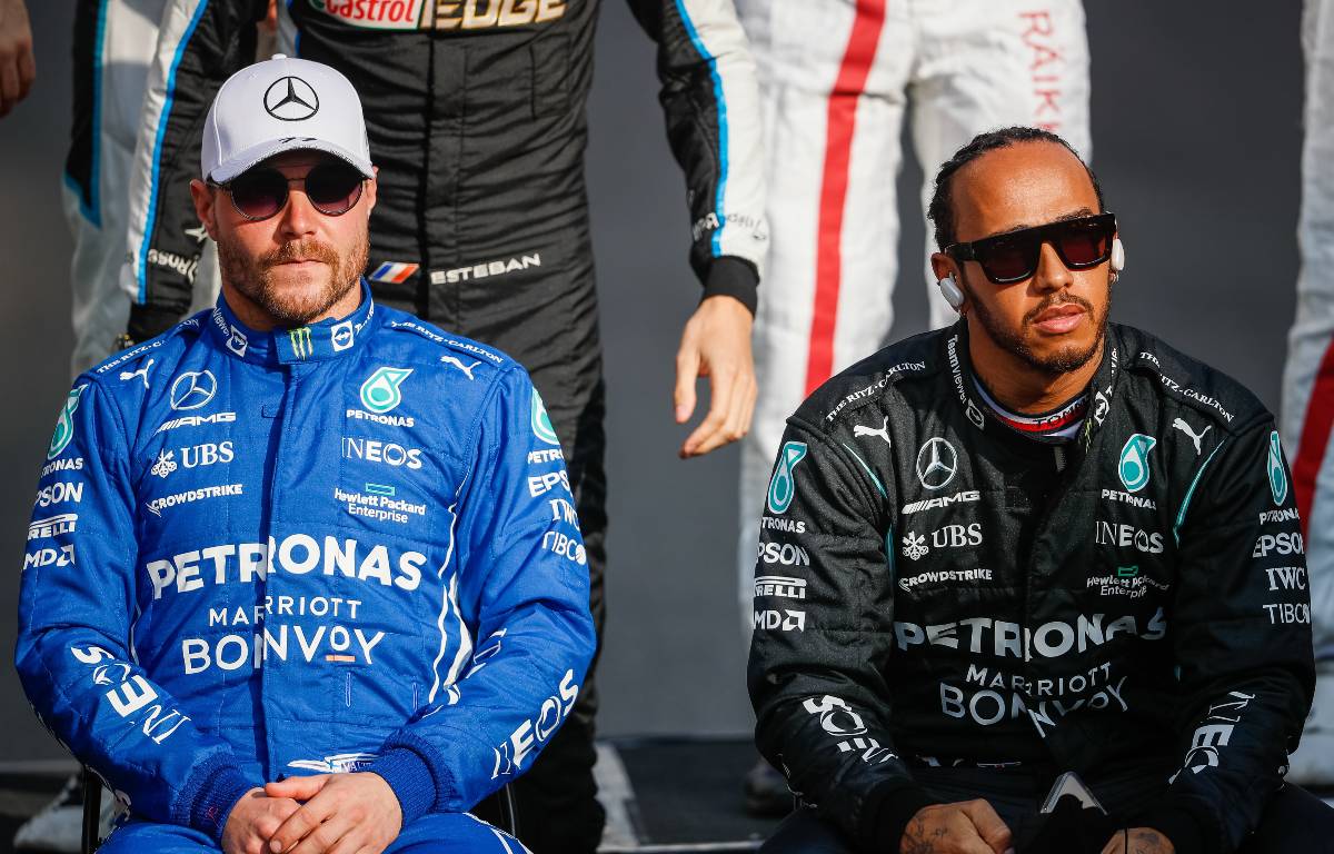Valtteri Bottas sitting next to Lewis Hamilton. Yas Marina December 2021.