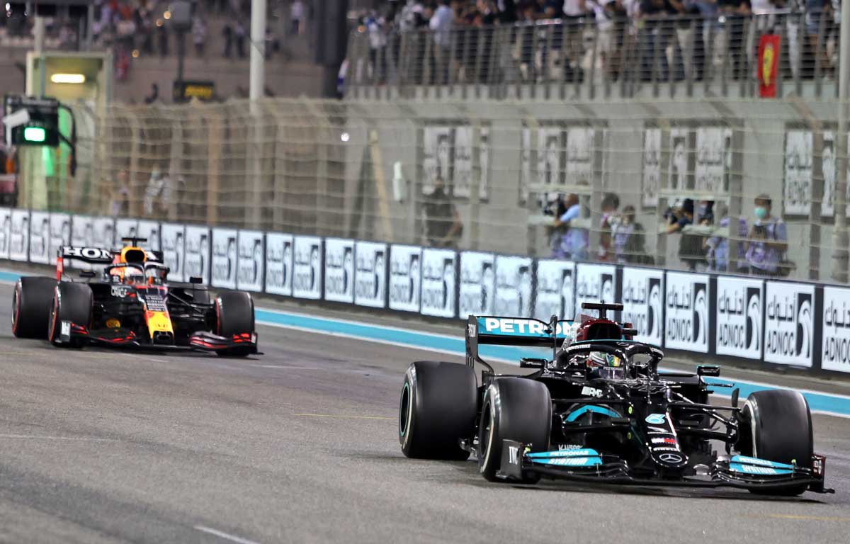 Mercedes driver Lewis Hamilton leads Red Bull Max Verstappen. Abu Dhabi December 2021.