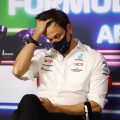 Toto Wolff moves his hair from his face. Abu Dhabi December 2021.