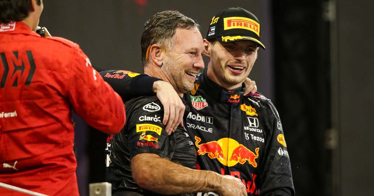 Christian Horner and Max Verstappen embrace. Abu Dhabi December 2021.