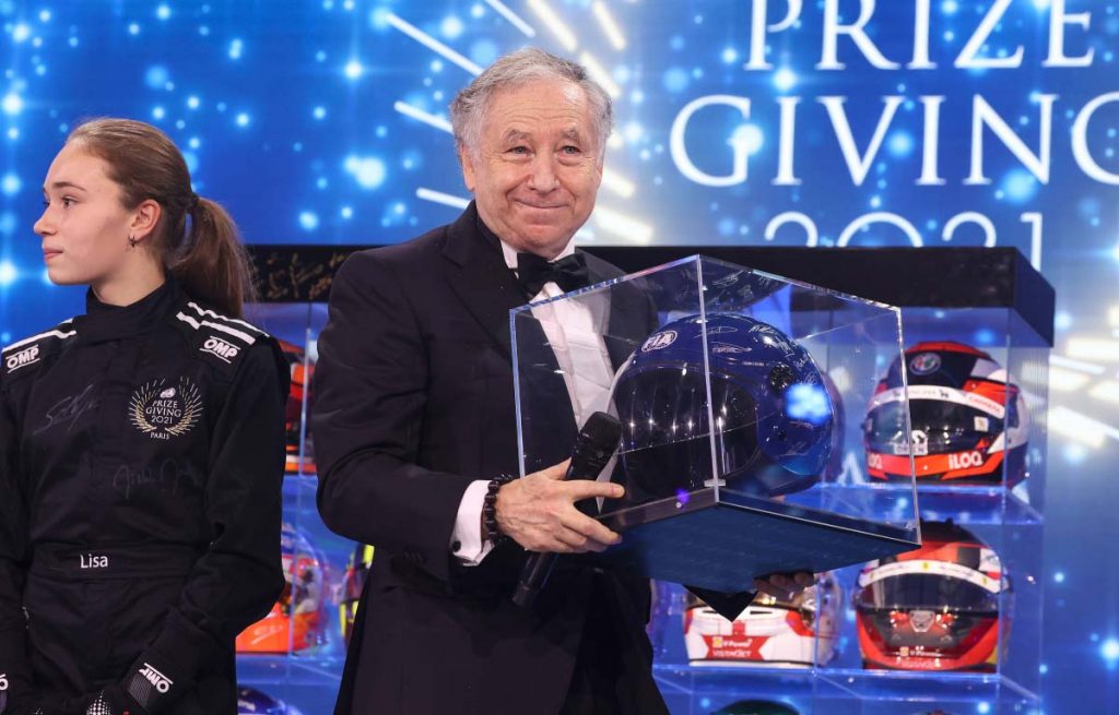 Jean Todt holds a helmet. FIA prize-giving Paris December 2021.