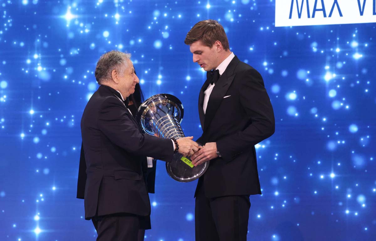 Jean Todt gives Max Verstappen his trophy. FIA prize-giving Paris December 2021.