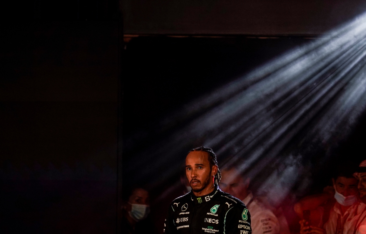 Lewis Hamilton with light shining on him. Abu Dhabi December 2021