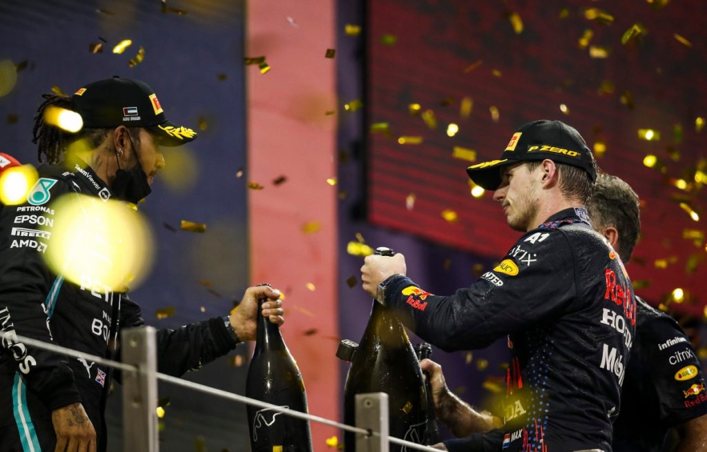 Lewis Hamilton and Max Verstappen on the podium. Abu Dhabi December 2021