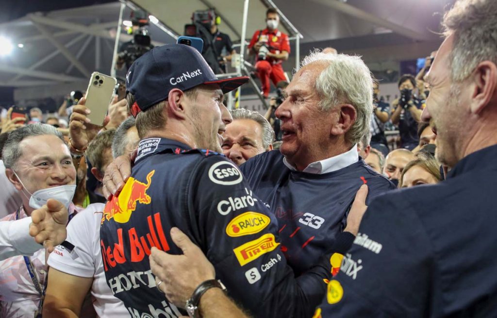 Max Verstappen and Helmut Marko embrace. Abu Dhabi December 2021.