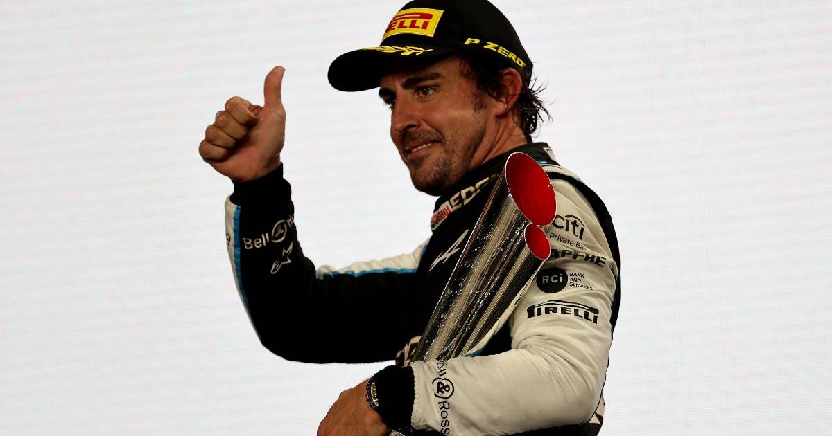 Fernando Alonso thumbs-up on the podium. Lusail November 2021.