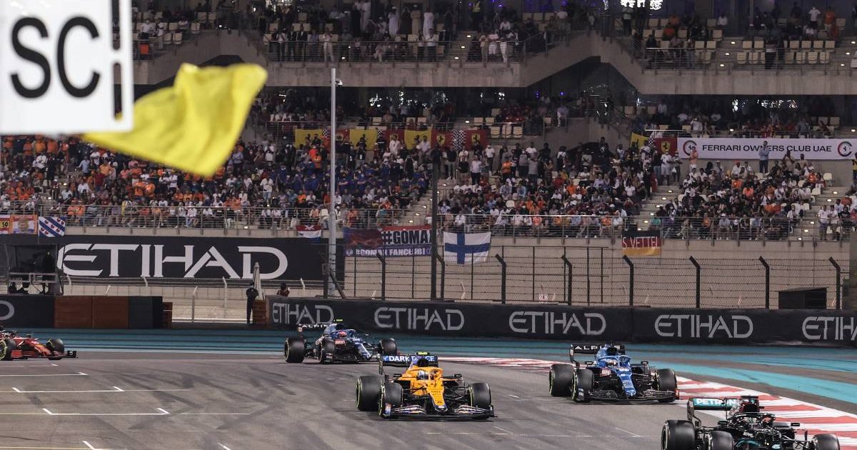 Cars pass Safety Car sign during Abu Dhabi GP. Yas Marina December 2021.