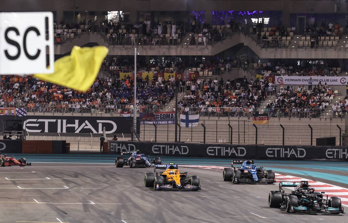 Cars pass Safety Car sign during Abu Dhabi GP. Yas Marina December 2021.