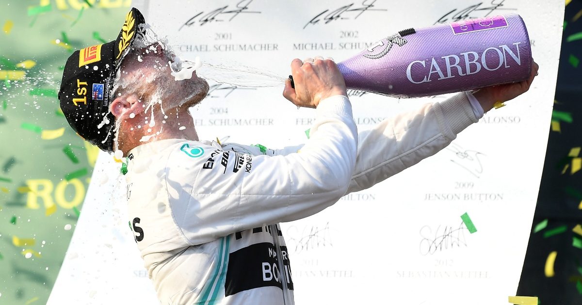 Valtteri Bottas spraying champagne in his face. Australia March 2019