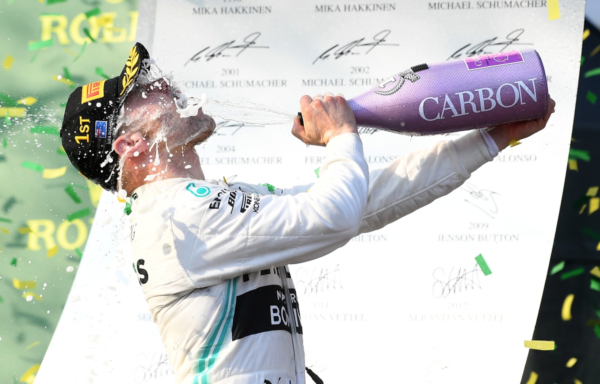 Valtteri Bottas spraying champagne in his face. Australia March 2019