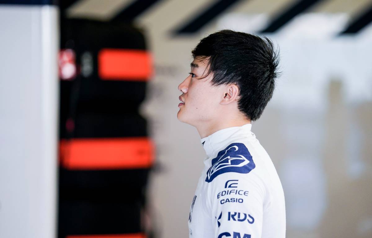 Yuki Tsunoda in the AlphaTauri garage. Yas Marina December 2021.