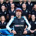 Fernando Alonso in front of Alpine team colleagues. Yas Marina December 2021.