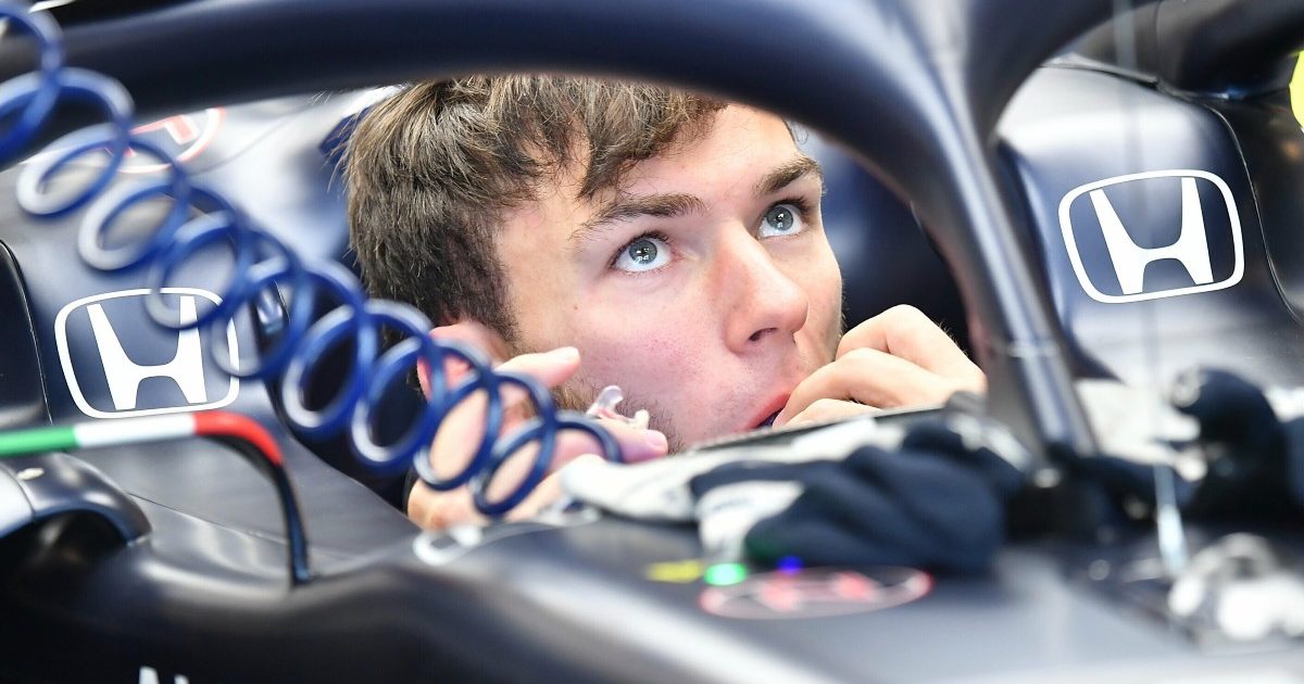 Pierre Gasly looks up from the AlphaTauri cockpit. Abu Dhabi, December 2021.