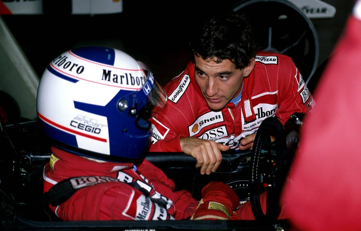 Alain Prost talks to Ayrton Senna. May 1989.