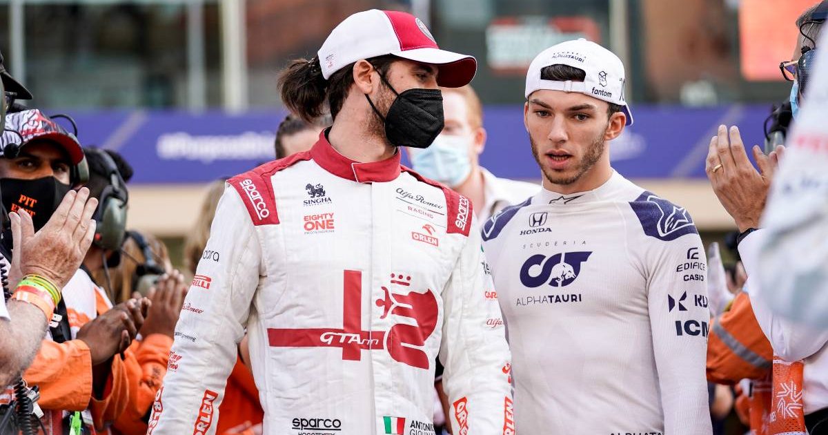 Antonio Giovinazzi and Pierre Gasly talking on the grid. Abu Dhabi, December 2021.