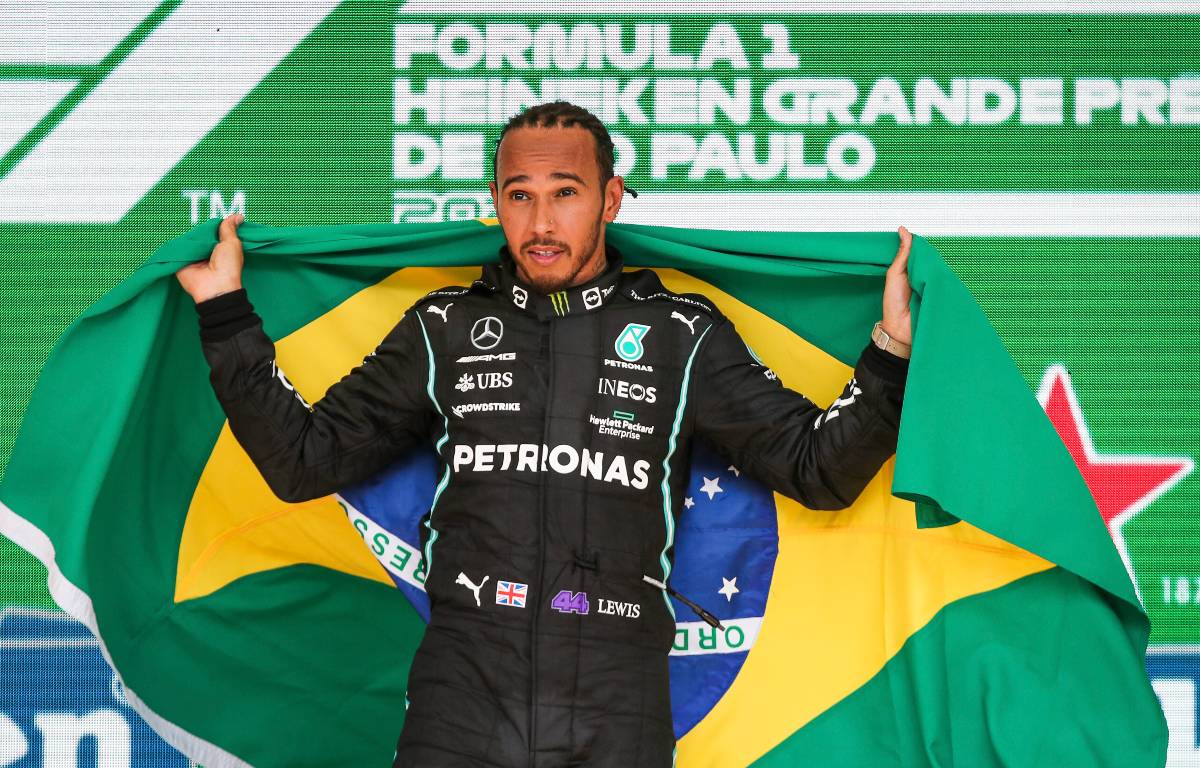 Lewis Hamilton celebrates victory with a Brazilian flag. Brazil, November 2021.