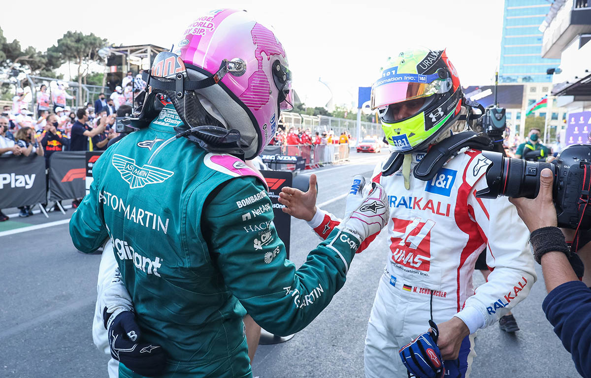 Sebastian Vettel and Mick Schumacher shake hands. Baku June 2021