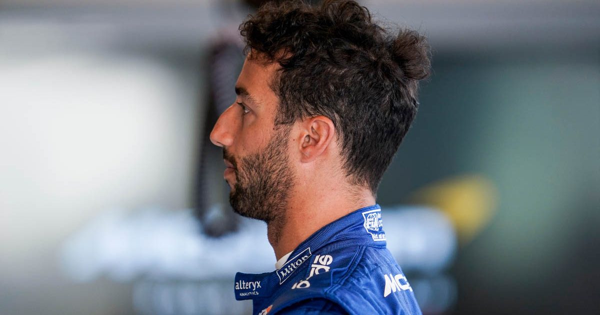 Daniel Ricciardo looks at data. Abu Dhabi December 2021.