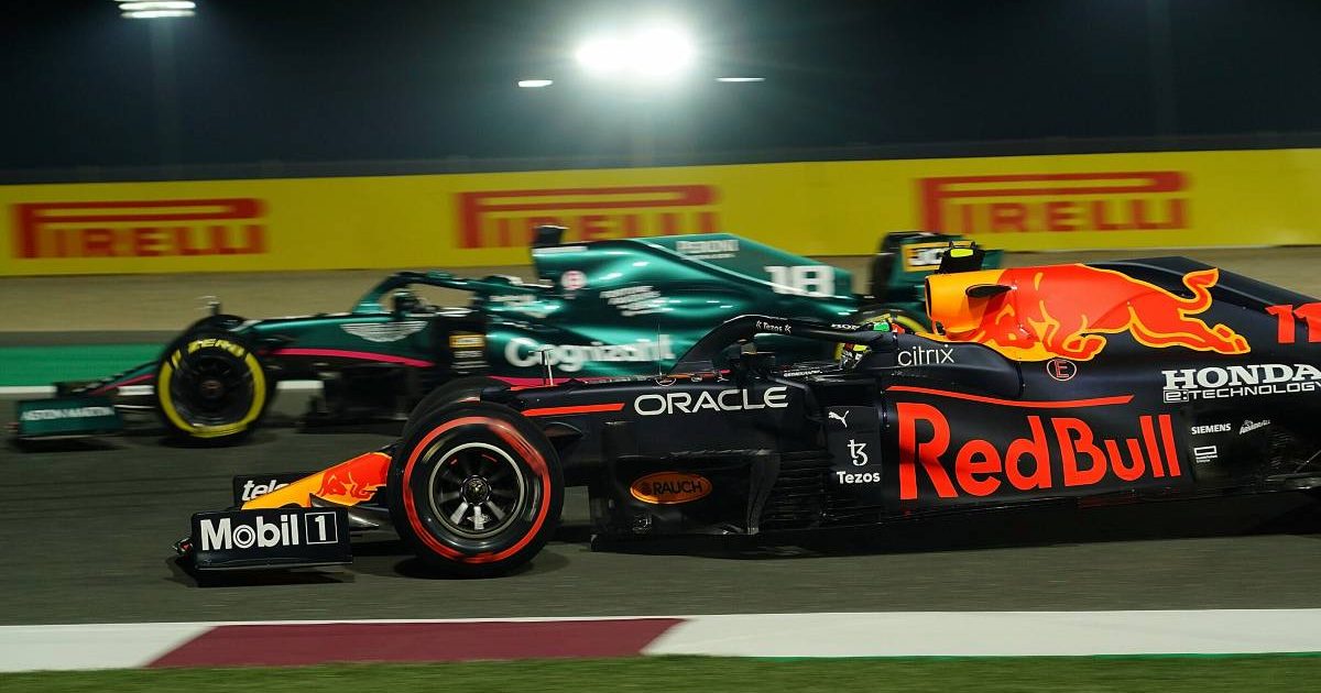 Lance Stroll alongside Sergio Perez at the Qatar GP. Lusail November 2021.