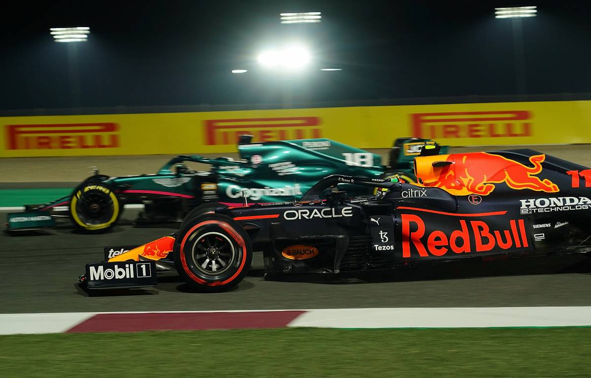 Lance Stroll alongside Sergio Perez at the Qatar GP. Lusail November 2021.