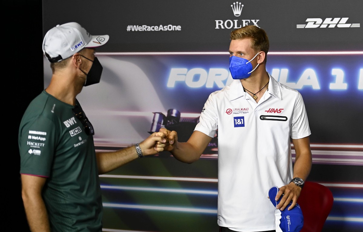 Sebastian Vettel and Mick Schumacher fist bump. Austria, June 2021.