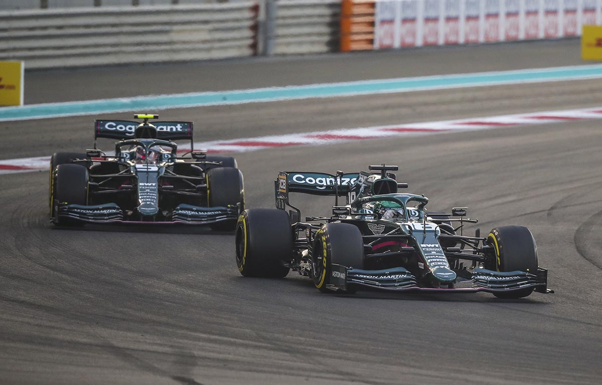 Lance Stroll and Sebastian Vettel in Aston Martin cars. Abu Dhabi December 2021