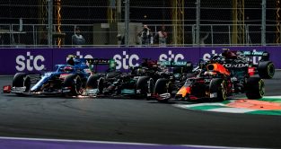 Esteban Ocon, Lewis Hamilton and Red Bull driver Max Verstappen side by side. F1 Saudi Arabia December 2021