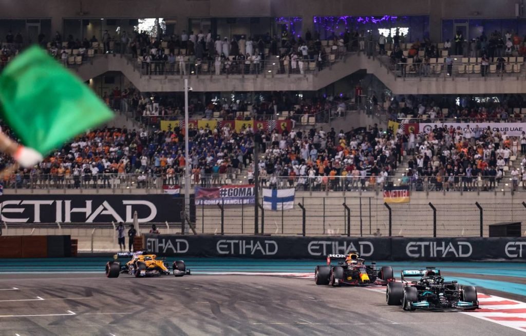 Lewis Hamilton leads starting the final lap of the Abu Dhabi GP. Yas Marina December 2021.