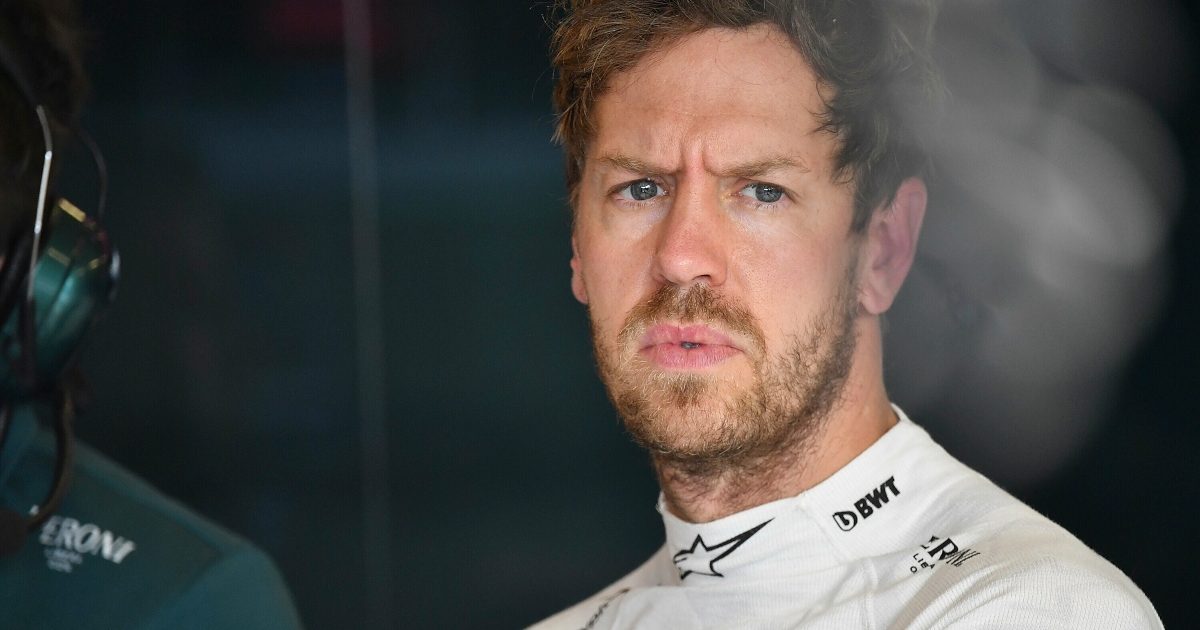 Sebastian Vettel frowns in the garage. Abu Dhabi December 2021