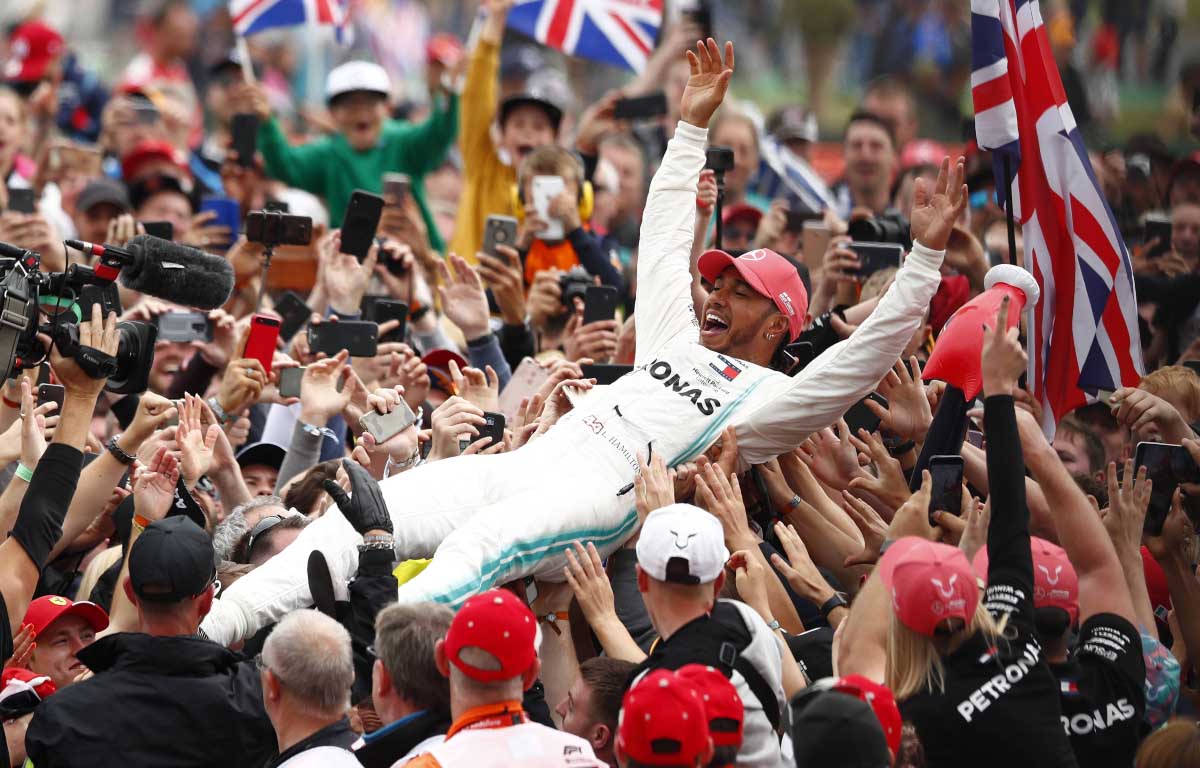 Lewis Hamilton crowd surfs. Formula 1 Silverstone July 2019.