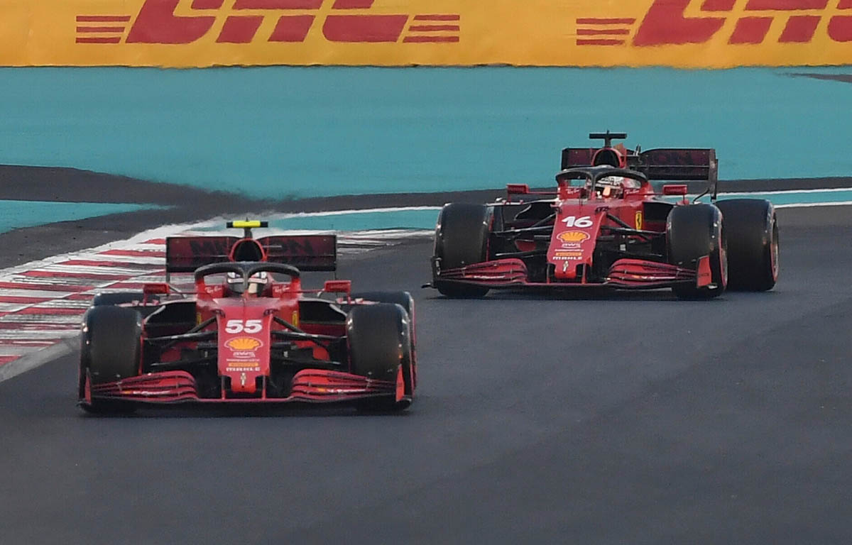 Charles Leclerc follows Ferrari team-mate Carlos Sainz. Abu Dhabi December 2021.