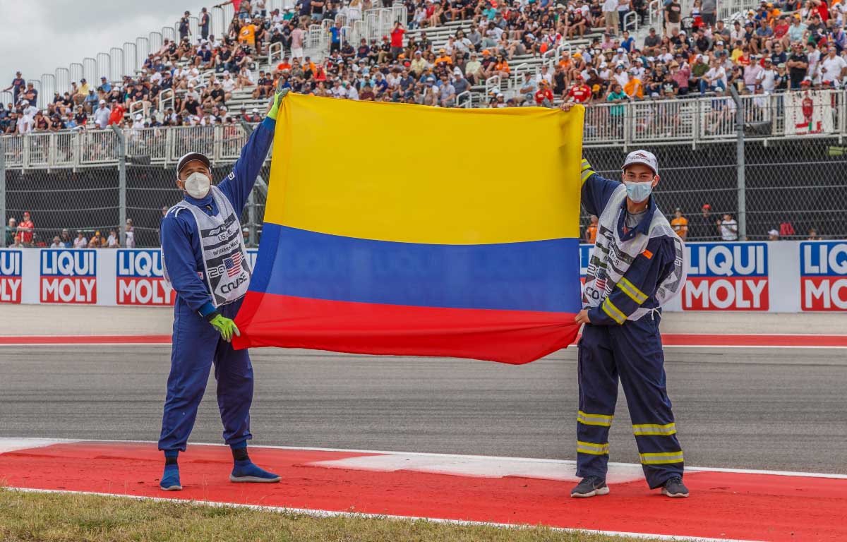 Formula 1 marshals hold up a flag of Colombia. USA October 2021.