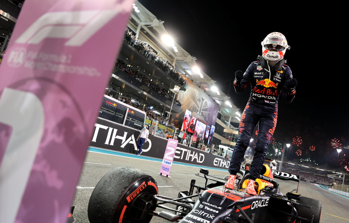 Max Verstappen standing on his Red Bull, no1. Abu Dhabi December 2021