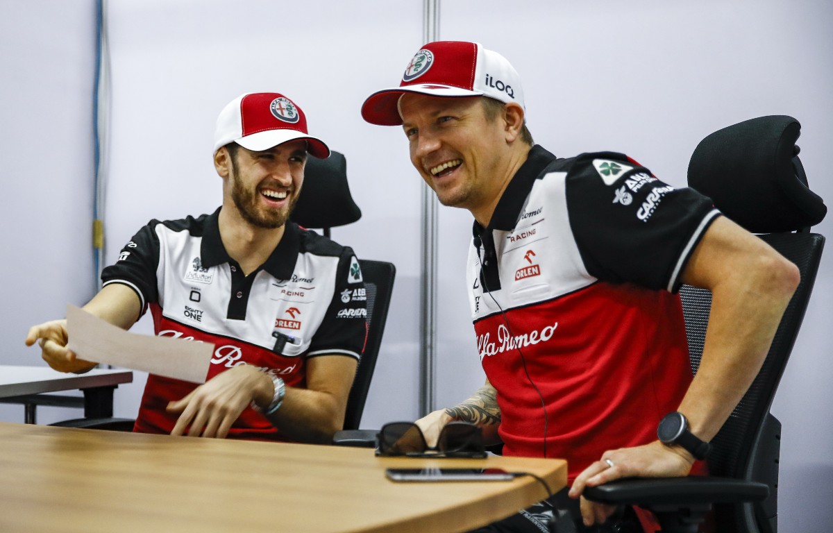 Antonio Giovinazzi and Kimi Raikkonen laughing. Qatar, November 2021.