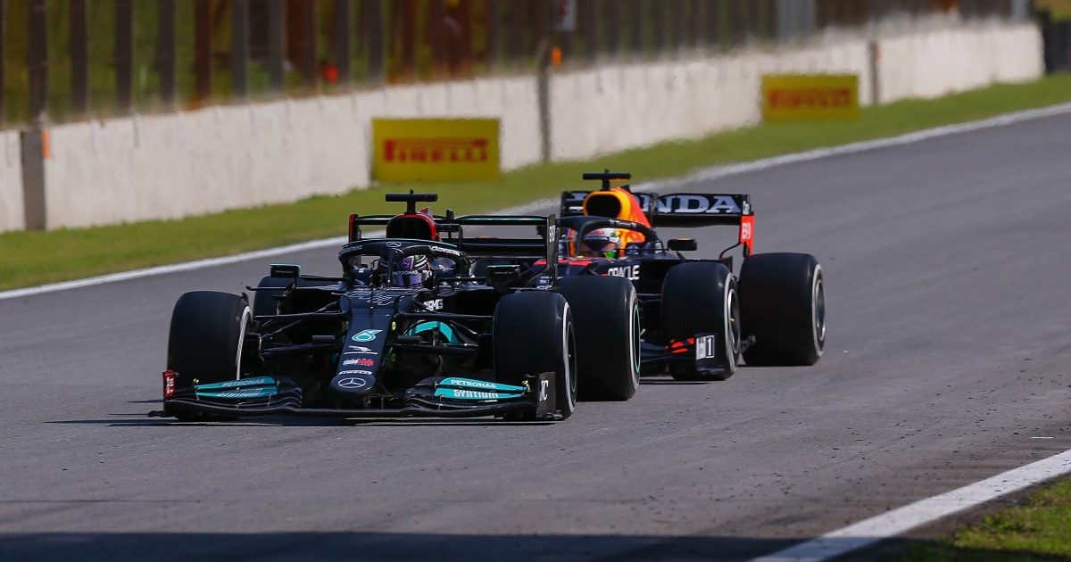 Max Verstappen tucked in behind Lewis Hamilton. Brazil, November 2021.