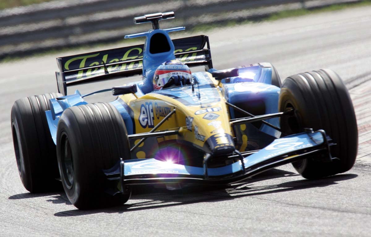 Fernando Alonso drives the Renault R24. Hungary August 2004.