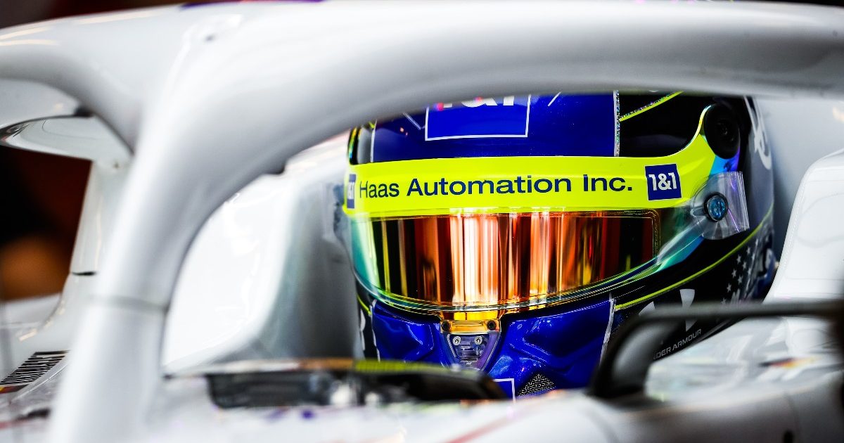 Mick Scumacher helmet down in the Haas. Abu Dhabi, December 2021.