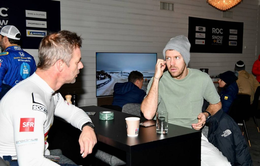 Sebastian Vettel chatting to Sebastien Loeb. Pitea February 2022.