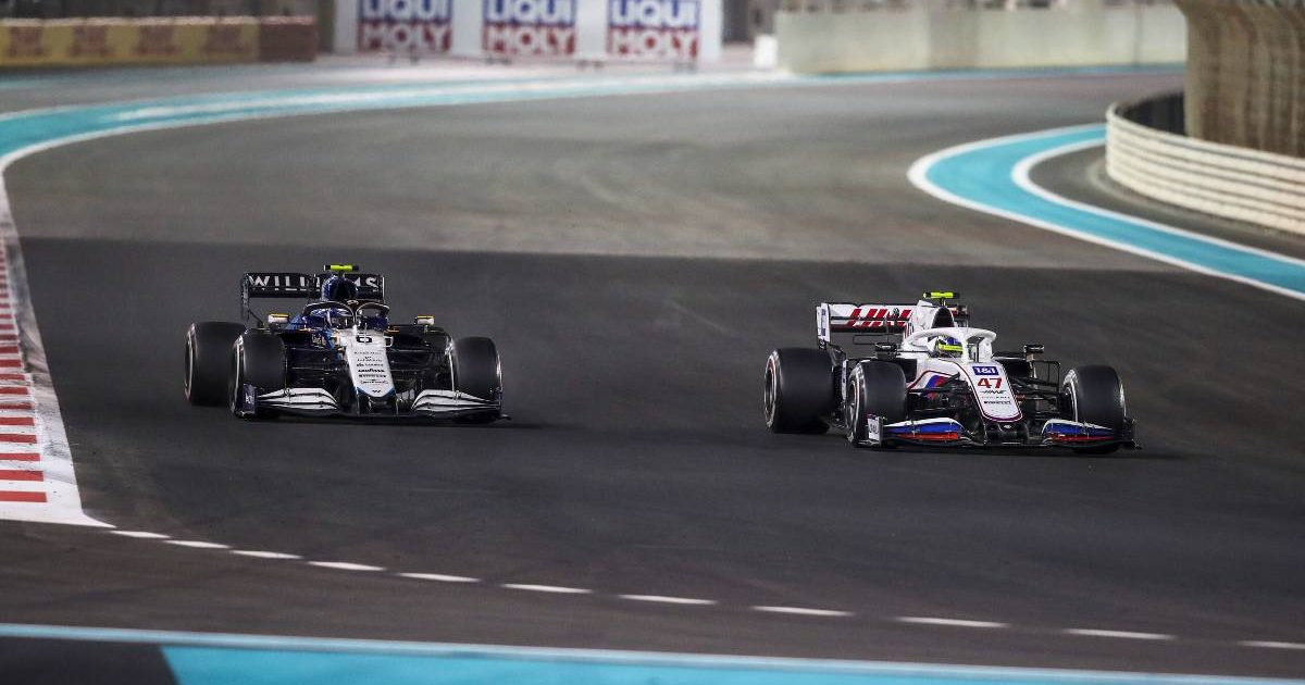 Mick Schumacher alongside Nicholas Latifi during the Abu Dhabi GP. Yas Marina December 2021.